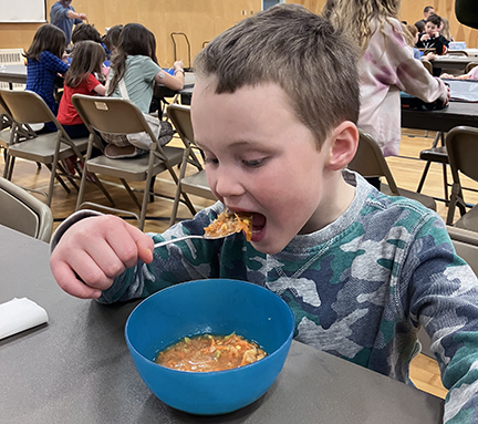 NCboy-eating-soup