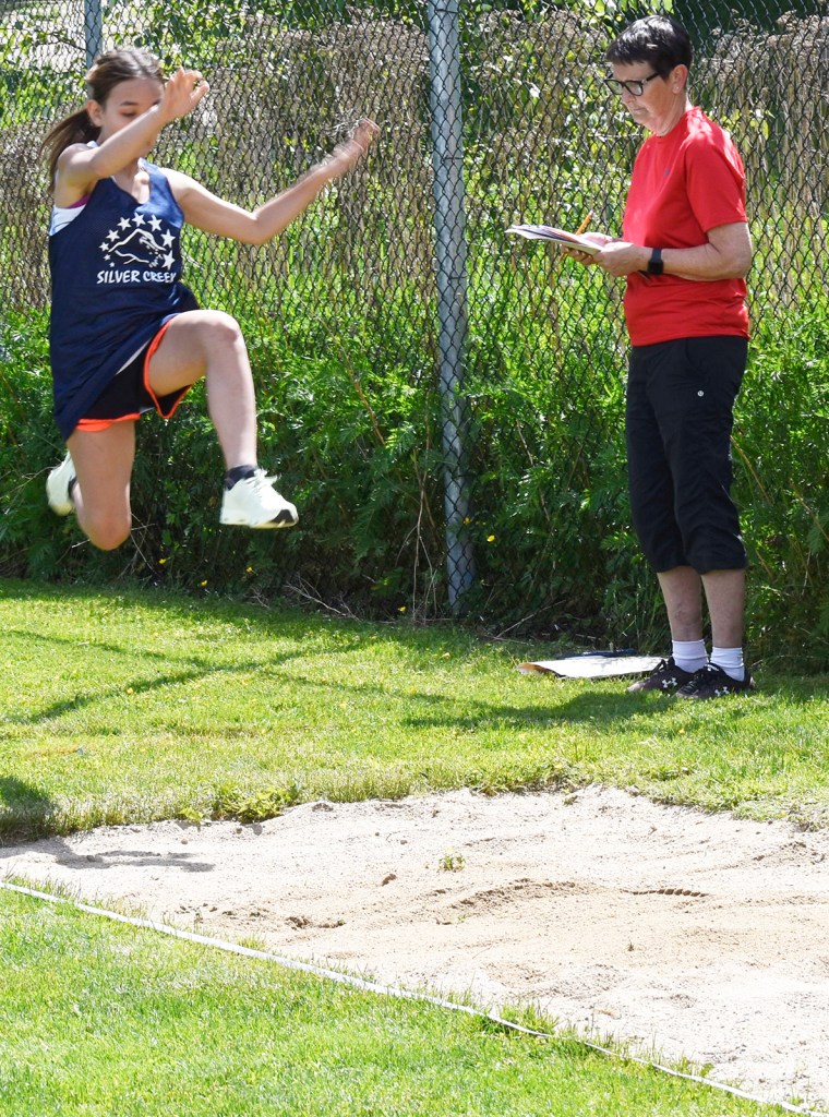 girl-long-jump-wide-vertical
