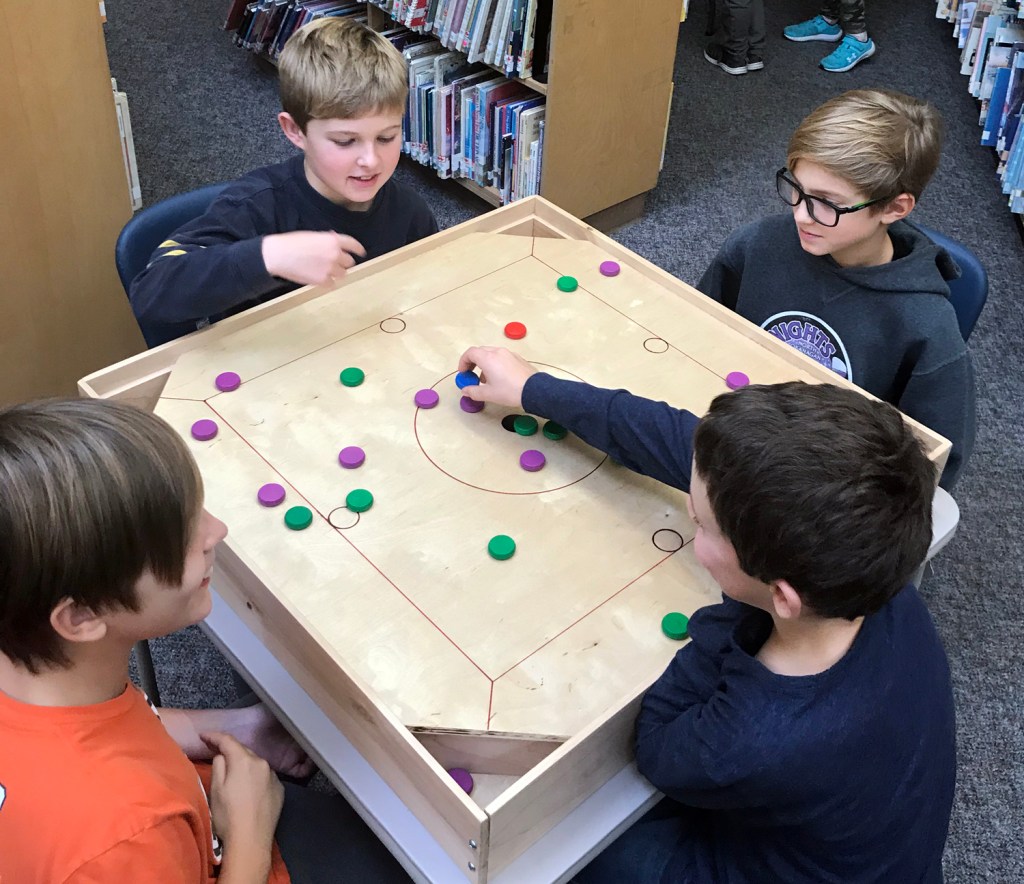 boys-playing-board-game