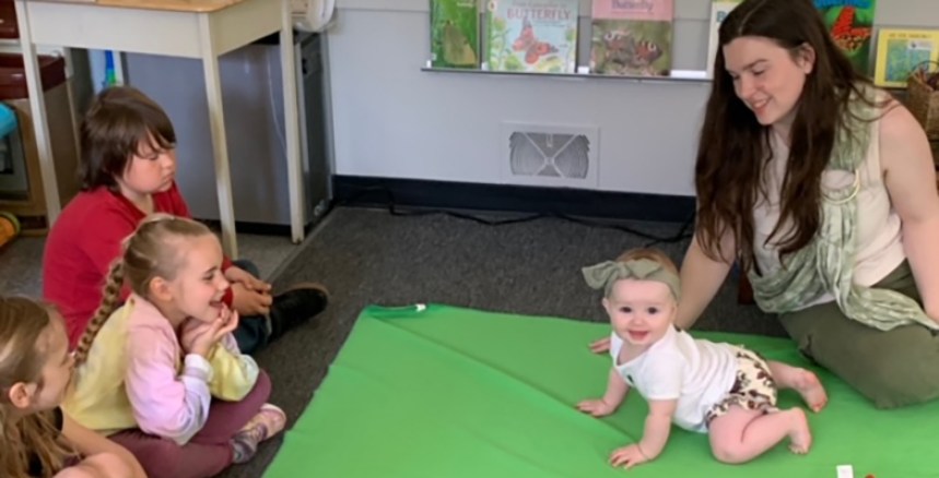 girl-with-baby-smiling